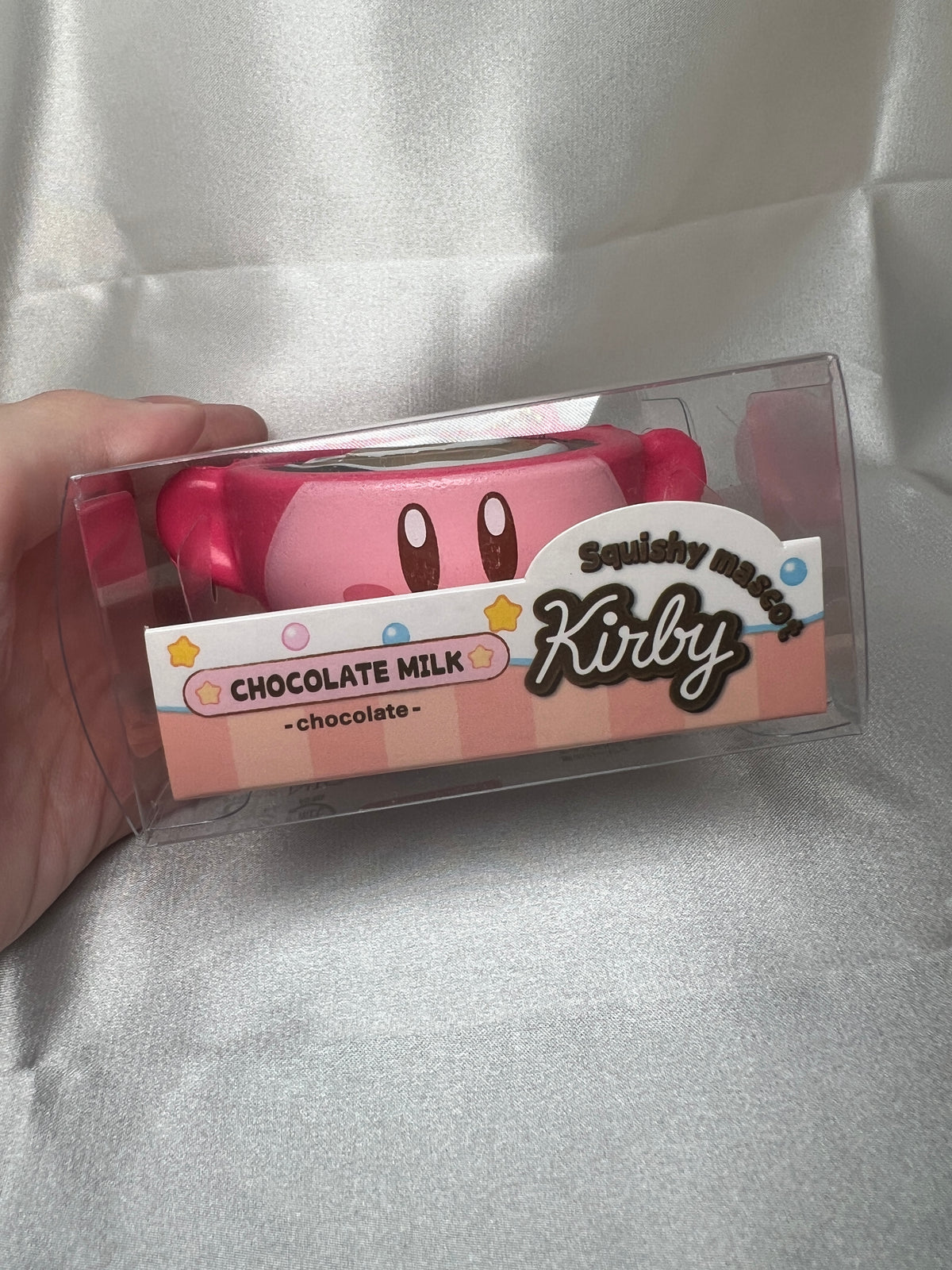 Kirby Chocolate Milk Squishy Mascot front view in original clear packaging