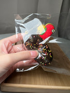 Vintage Rilakkuma Kiiroitori eclair squishy showing cracked chocolate frosting