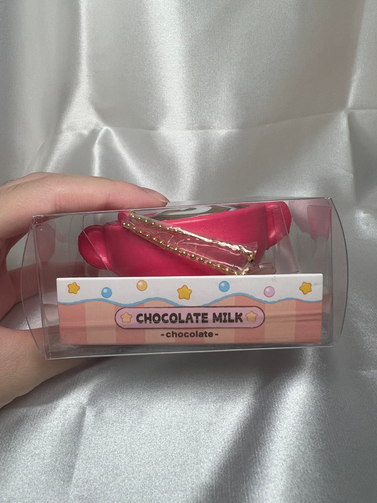 Kirby Chocolate Milk Squishy Mascot side view with gold ball chain in clear box