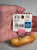 Back of original Sanrio tag on 2016 Hello Kitty pink donut squishy