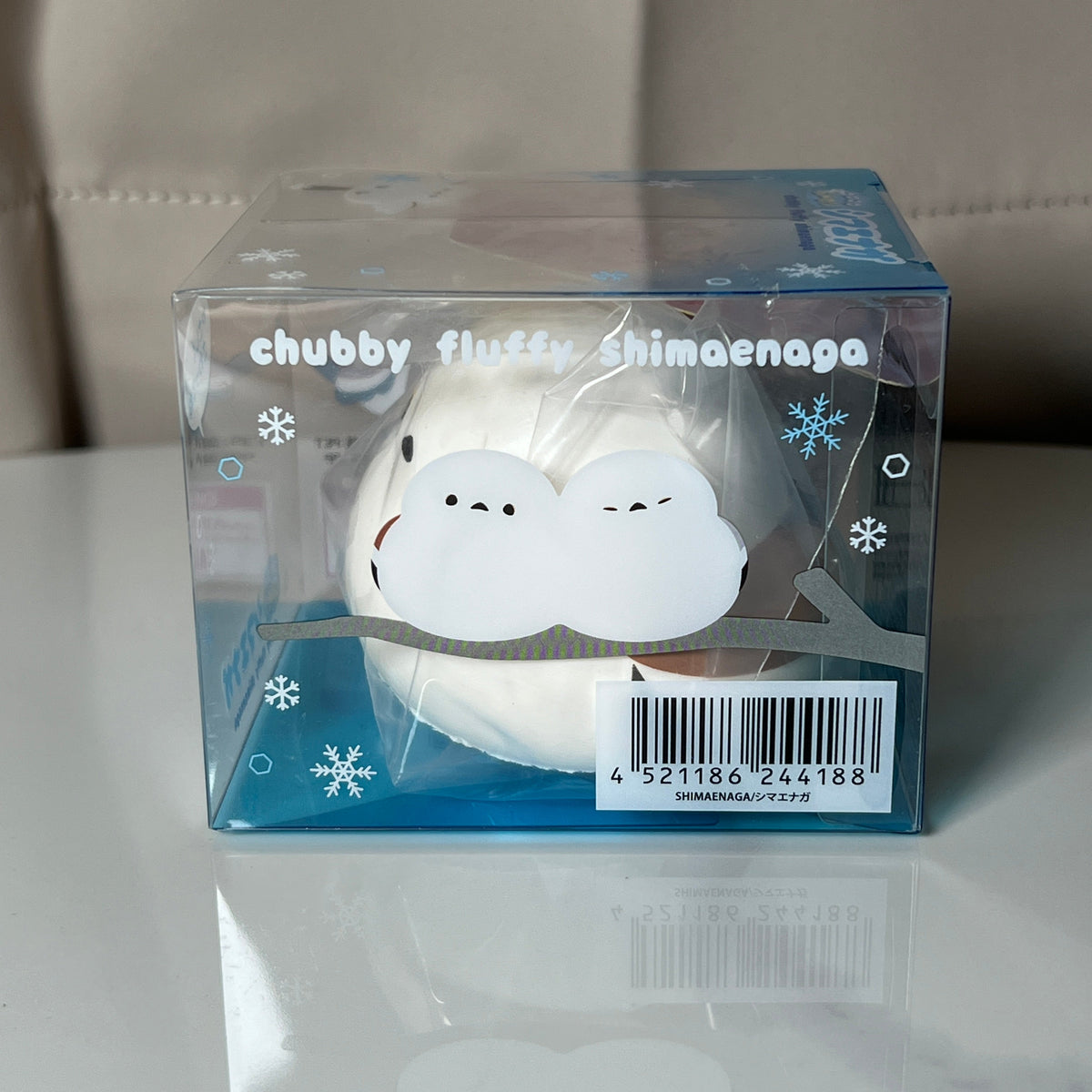 iBLOOM Chubby Fluffy Shimaenaga Squishy back packaging with barcode 4521186244188