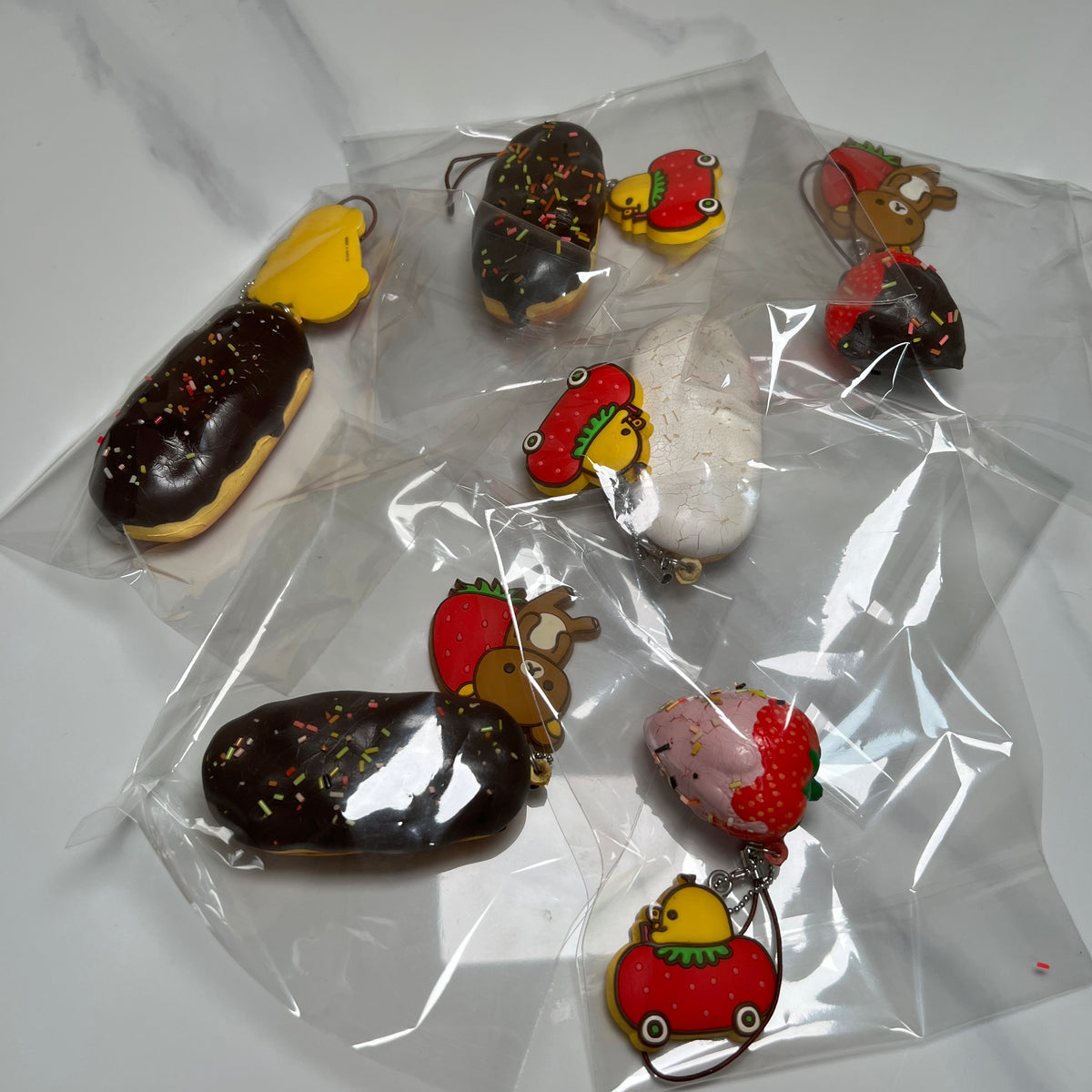 Full set of rare 2009 San-X Rilakkuma Kiiroitori chocolate eclair squishy mascot straps group photo