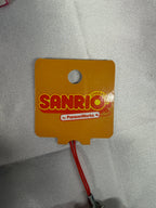 Front of 2011 Sanrio PansonWorks Hello Kitty Squishy Strap paper tag