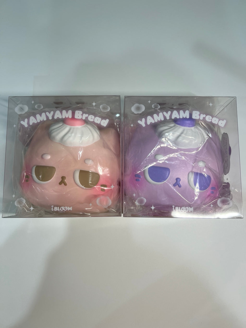 Authentic iBLOOM YAMYAM Bread squishy in strawberry pink and grape purple
